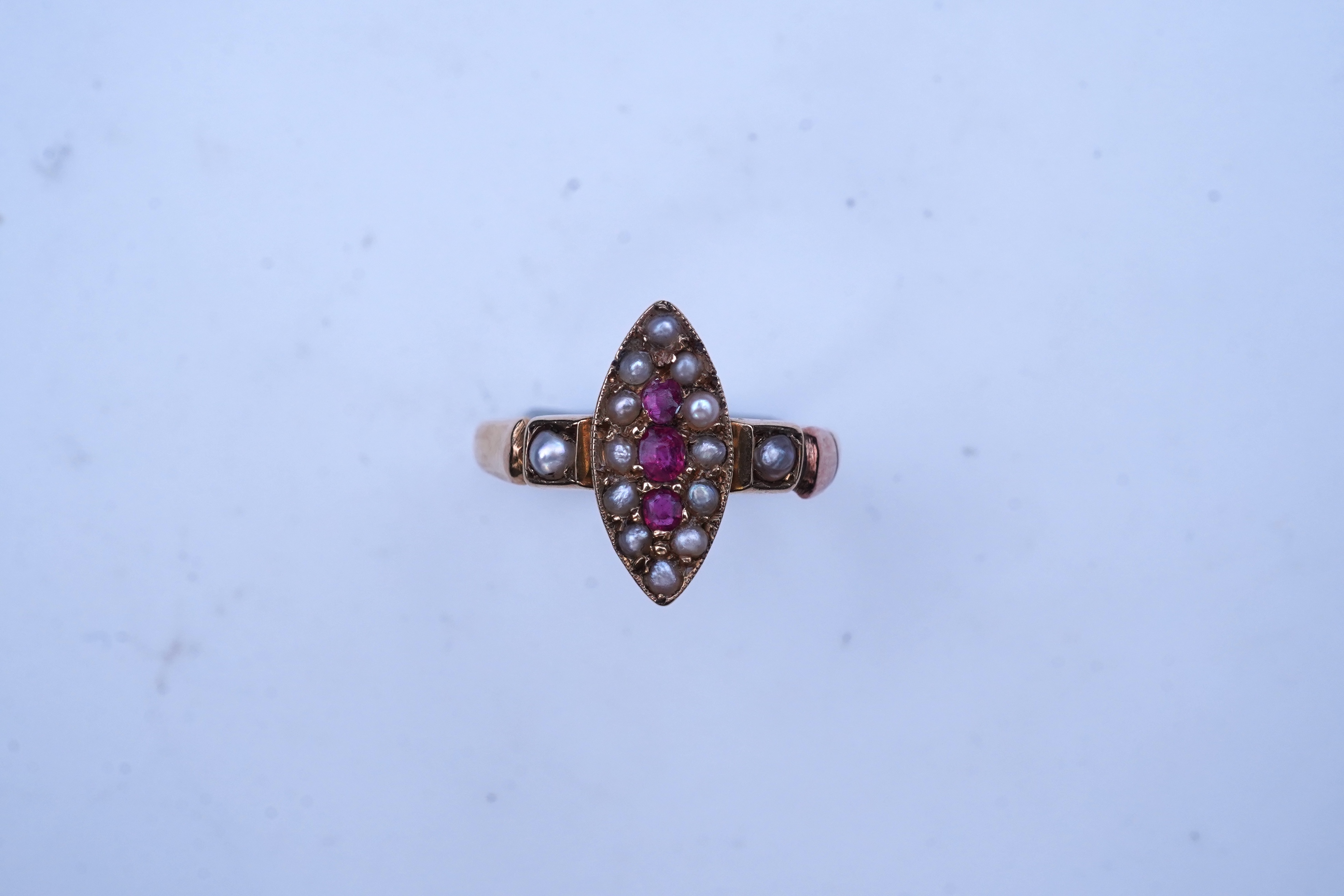 A Victorian ruby and seed pearl ring, circa 1876